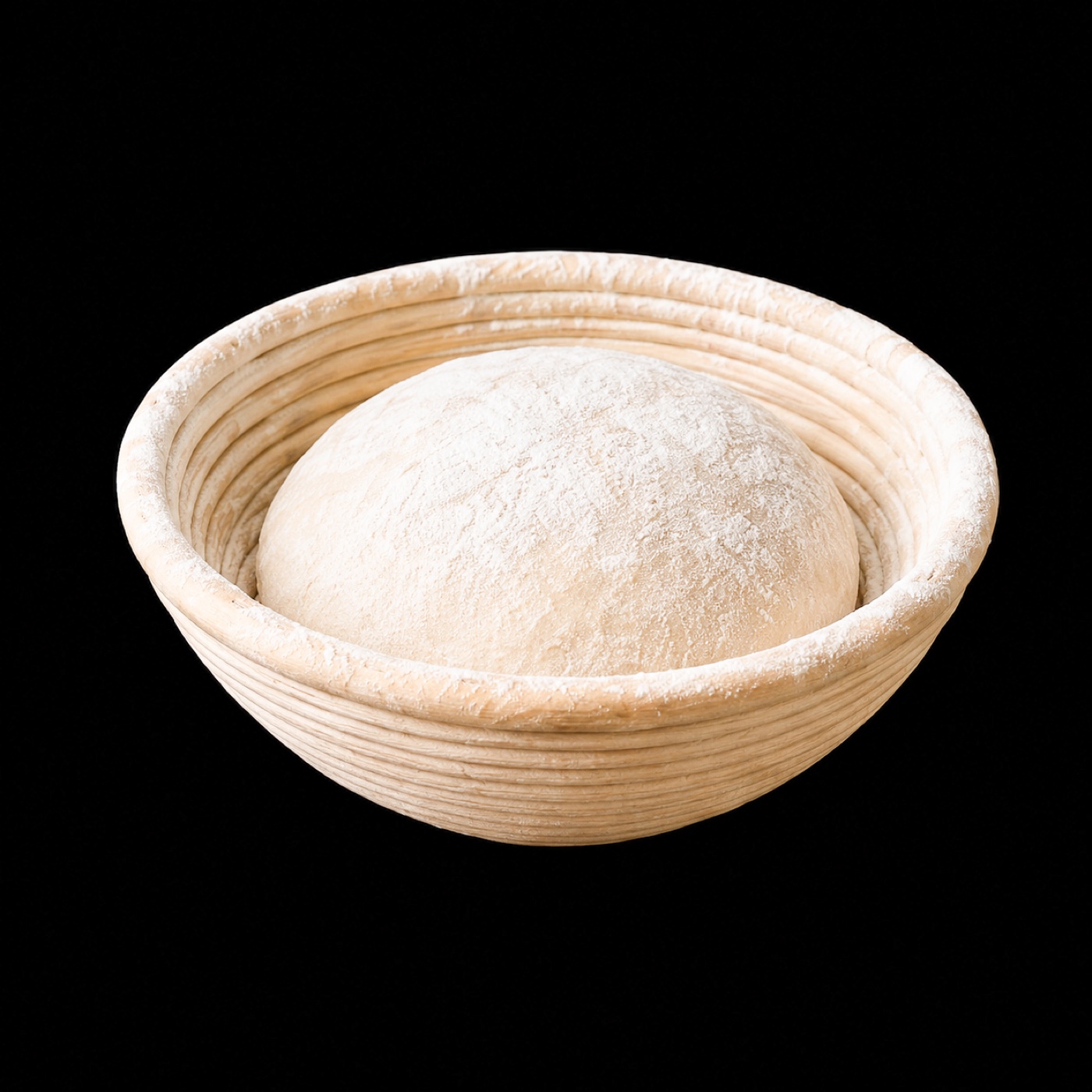 Masa fermentando en cesta de mimbre banneton
